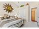 Bedroom showcasing neutral decor and closet for storage at 9327 E Whitewing Dr, Scottsdale, AZ 85262
