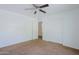 Bedroom with standard closet, carpet floors and ample natural light at 9541 W Frank Ave, Peoria, AZ 85382