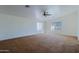 Bedroom featuring natural light, a ceiling fan, and carpeted floors at 9541 W Frank Ave, Peoria, AZ 85382