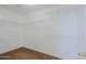 Walk-in closet with carpet floors and wire shelves along the walls at 9541 W Frank Ave, Peoria, AZ 85382