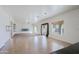 Large open-concept with tile and carpet, natural light, and ceiling fan at 9541 W Frank Ave, Peoria, AZ 85382