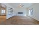 Open floor plan features ceiling fan and lots of natural light at 9541 W Frank Ave, Peoria, AZ 85382