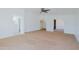 Living space with neutral tones, carpet flooring, and an open layout at 9541 W Frank Ave, Peoria, AZ 85382