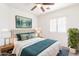 Comfortable bedroom with a queen-sized bed, stylish decor, and ample natural light creating a cozy retreat at 10325 W Sands Dr # 456, Peoria, AZ 85383