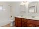 Bathroom with double sink vanity, tile flooring, and shower at 17808 N 45Th Ave, Glendale, AZ 85308