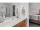 Bathroom showing dual sinks, and mirror at 17808 N 45Th Ave, Glendale, AZ 85308