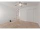 Bedroom featuring neutral carpet, ceiling fan, and closet at 17808 N 45Th Ave, Glendale, AZ 85308