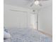 Bedroom with ceiling fan and closet for ample storage at 17808 N 45Th Ave, Glendale, AZ 85308