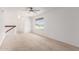 Large upstairs bonus room featuring a window and carpeted floors at 17808 N 45Th Ave, Glendale, AZ 85308