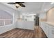 Open concept dining area adjacent to the kitchen with wood-look floors at 17808 N 45Th Ave, Glendale, AZ 85308