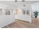 Open concept dining area featuring a pass-through to the kitchen at 17808 N 45Th Ave, Glendale, AZ 85308