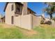 The backyard with a block wall and a grassy lawn at 17808 N 45Th Ave, Glendale, AZ 85308