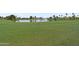 Scenic view of the lush green golf course and pond at 17808 N 45Th Ave, Glendale, AZ 85308