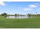 Scenic view of the golf course pond with a fountain at 17808 N 45Th Ave, Glendale, AZ 85308