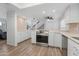Open-concept kitchen with stainless steel appliances and modern finishes at 17808 N 45Th Ave, Glendale, AZ 85308