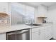 Close-up of a kitchen sink features stainless steel appliances and modern finishes at 17808 N 45Th Ave, Glendale, AZ 85308