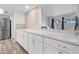 Stylish kitchen counter featuring a tiled backsplash and stainless steel appliances at 17808 N 45Th Ave, Glendale, AZ 85308