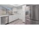Modern kitchen boasts stainless steel appliances, ample cabinet space, and bright lighting at 17808 N 45Th Ave, Glendale, AZ 85308