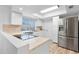 Modern kitchen boasts stainless steel appliances and ample counter space at 17808 N 45Th Ave, Glendale, AZ 85308