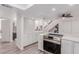 Bright kitchen with white cabinets, stainless appliances, and modern backsplash at 17808 N 45Th Ave, Glendale, AZ 85308