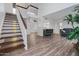 Spacious living room area with open floor plan and staircase at 17808 N 45Th Ave, Glendale, AZ 85308
