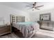 Bedroom with contemporary furnishings, ceiling fan, and ample closet space at 17808 N 45Th Ave, Glendale, AZ 85308