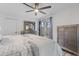 Bedroom features a ceiling fan, and sliding glass door at 17808 N 45Th Ave, Glendale, AZ 85308