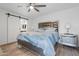 Bedroom with wood-look floors and ceiling fan at 17808 N 45Th Ave, Glendale, AZ 85308