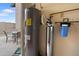 Water heater, water filtration system, and view to the patio at 17808 N 45Th Ave, Glendale, AZ 85308