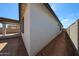 A view of the home's exterior showcasing the home's architectural style and landscaping at 18220 W Daley Ln, Surprise, AZ 85387
