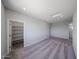Bonus room with carpet flooring, recessed lighting, and an adjacent open closet space at 18244 W Daley Ln, Surprise, AZ 85387