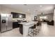 Open kitchen and living space with modern appliances and a center island at 10347 S Saguaro Dr, Apache Junction, AZ 85120