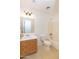 Standard bathroom with a combination shower and tub with a single sink and a wood vanity at 1037 E Dust Devil Dr, San Tan Valley, AZ 85143