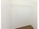 Empty walk-in closet featuring neutral walls and carpeting at 1037 E Dust Devil Dr, San Tan Valley, AZ 85143