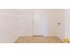 Bright laundry room features wire shelving, white walls, and tile flooring for a clean, organized space at 1037 E Dust Devil Dr, San Tan Valley, AZ 85143