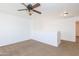 Inviting loft area with soft carpet, ceiling fan, neutral walls, a versatile living space at 1037 E Dust Devil Dr, San Tan Valley, AZ 85143