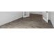 The office features wood-look tile floors and glass doors for privacy and natural light at 11432 E Utopia Ave, Mesa, AZ 85212