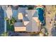 Aerial view of a home with a large tile roof and private pool at 1147 E Lodgepole Dr, Gilbert, AZ 85298