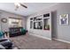 Bright living room featuring a built-in entertainment center, comfy sofas, and neutral decor at 1147 E Lodgepole Dr, Gilbert, AZ 85298
