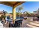 Inviting backyard oasis featuring a sparkling pool, spa, and comfortable seating area at 1147 E Lodgepole Dr, Gilbert, AZ 85298