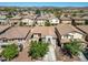 Bird's eye view showcases a two story home's roof, backyard, driveway and landscaping in a residential neighborhood at 11732 W Foothill Dr, Sun City, AZ 85373
