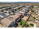 Aerial view of new homes in community with landscaping, yards, and tile roofs at 11732 W Foothill Dr, Sun City, AZ 85373