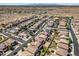 High aerial view displaying a residential neighborhood complete with desert landscaping and swimming pools at 11732 W Foothill Dr, Sun City, AZ 85373