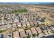 Aerial view of a neighborhood with desert landscape, street design, and tile roofs at 11732 W Foothill Dr, Sun City, AZ 85373