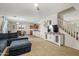 Inviting living area showcases an open layout, connecting the dining and kitchen spaces with a cozy ambiance at 11732 W Foothill Dr, Sun City, AZ 85373