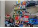 Well-stocked walk-in pantry with abundant shelving to keep groceries organized and easily accessible at 11732 W Foothill Dr, Sun City, AZ 85373
