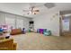 Bright playroom with ample space for toys, creative activities, and imaginative fun at 11732 W Foothill Dr, Sun City, AZ 85373