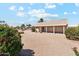 Backyard with desert landscaping, covered patio, and plenty of space at 1245 E Waterview Pl, Chandler, AZ 85249