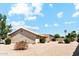 Spacious backyard with low-maintenance gravel and various plants and bushes at 1245 E Waterview Pl, Chandler, AZ 85249