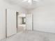 Clean bedroom with neutral paint, plush carpeting, and an open doorway leading to other rooms at 1245 E Waterview Pl, Chandler, AZ 85249